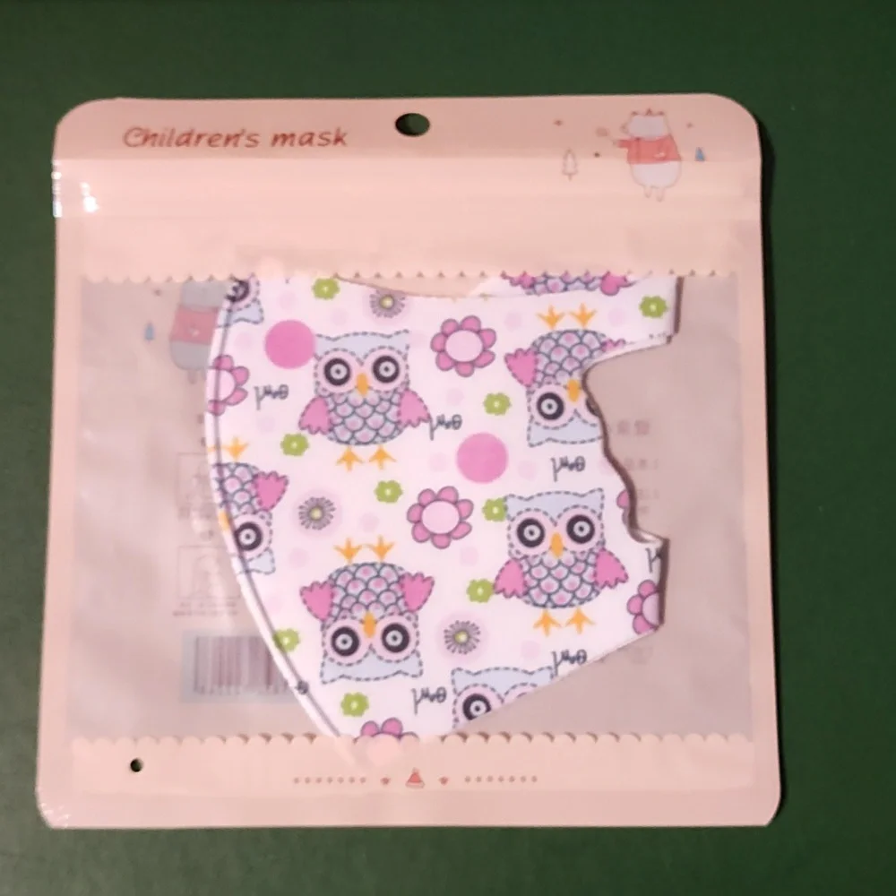 Children's re Usable face mask new in package never opened